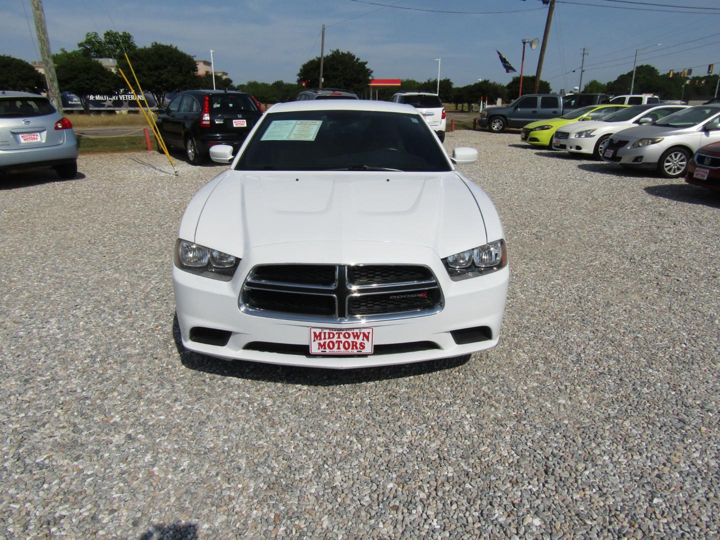 2014 White /Tan Dodge Charger SE (2C3CDXBG6EH) with an 3.6L V6 DOHC 24V engine, Automatic transmission, located at 15016 S Hwy 231, Midland City, AL, 36350, (334) 983-3001, 31.306210, -85.495277 - Photo#1